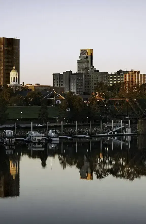 Augusta, GA downtown skyline along the Savannah River, home market for business brokers Augusta GA