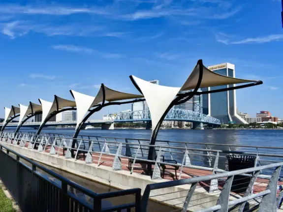 Riverfront promenade on the Southbank in Jacksonville, FL, near offices and restaurants that change hands through local business sales