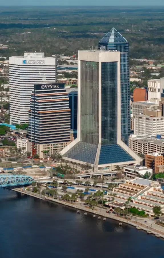 Aerial view of downtown Jacksonville on the St. Johns River, where owners meet with business brokers in Jacksonville to plan a sale