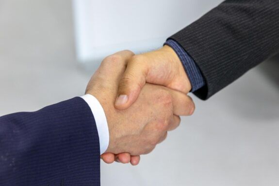 Professional handshake in a business meeting