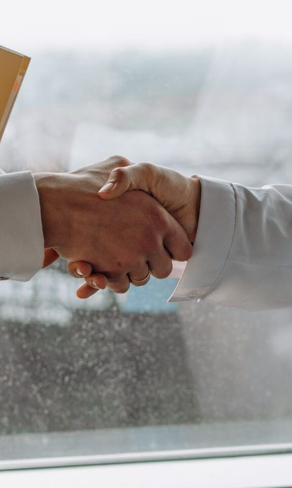 Business people shaking hands in an office
