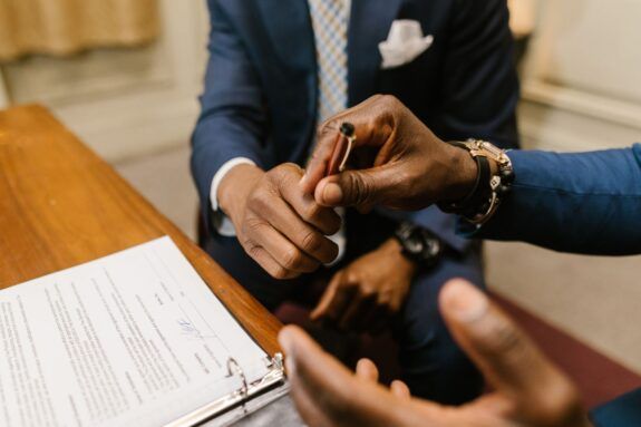 Two business owners finalizing a contract