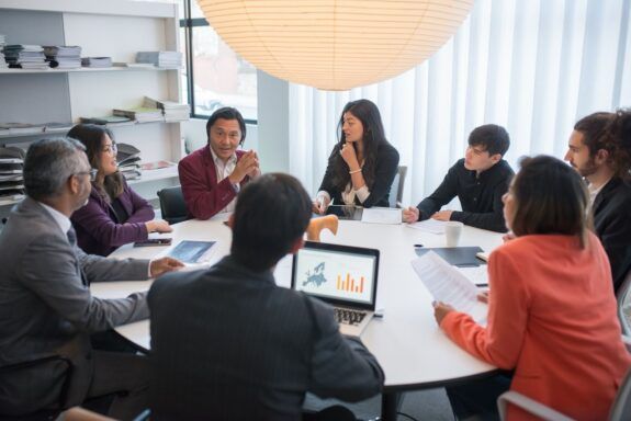 Business team seated at a meeting table