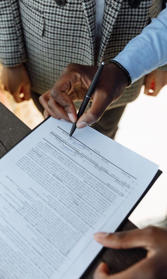 A person signing a business contract