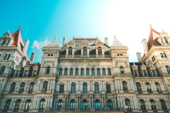 Facade of the New York State Capitol under a clear sky