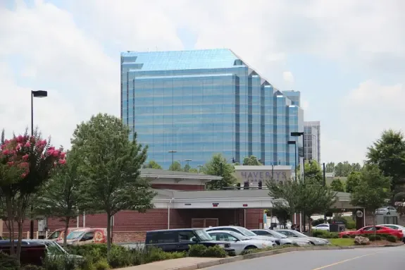 Central Parkway office tower in Sandy Springs, GA where local business owners sell and buy businesses