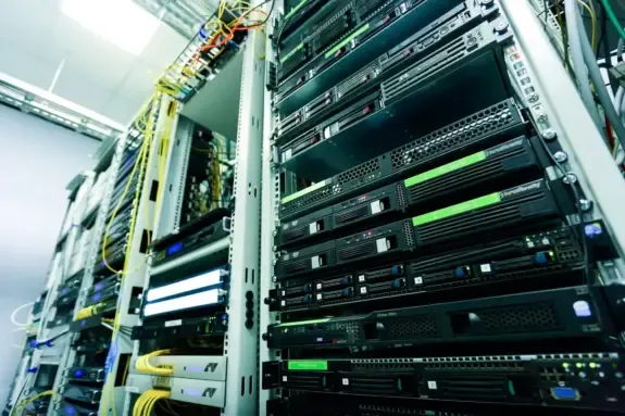 Rack-mounted servers and network cabling inside a hosting provider facility